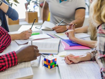 crop-people-with-textbooks-table