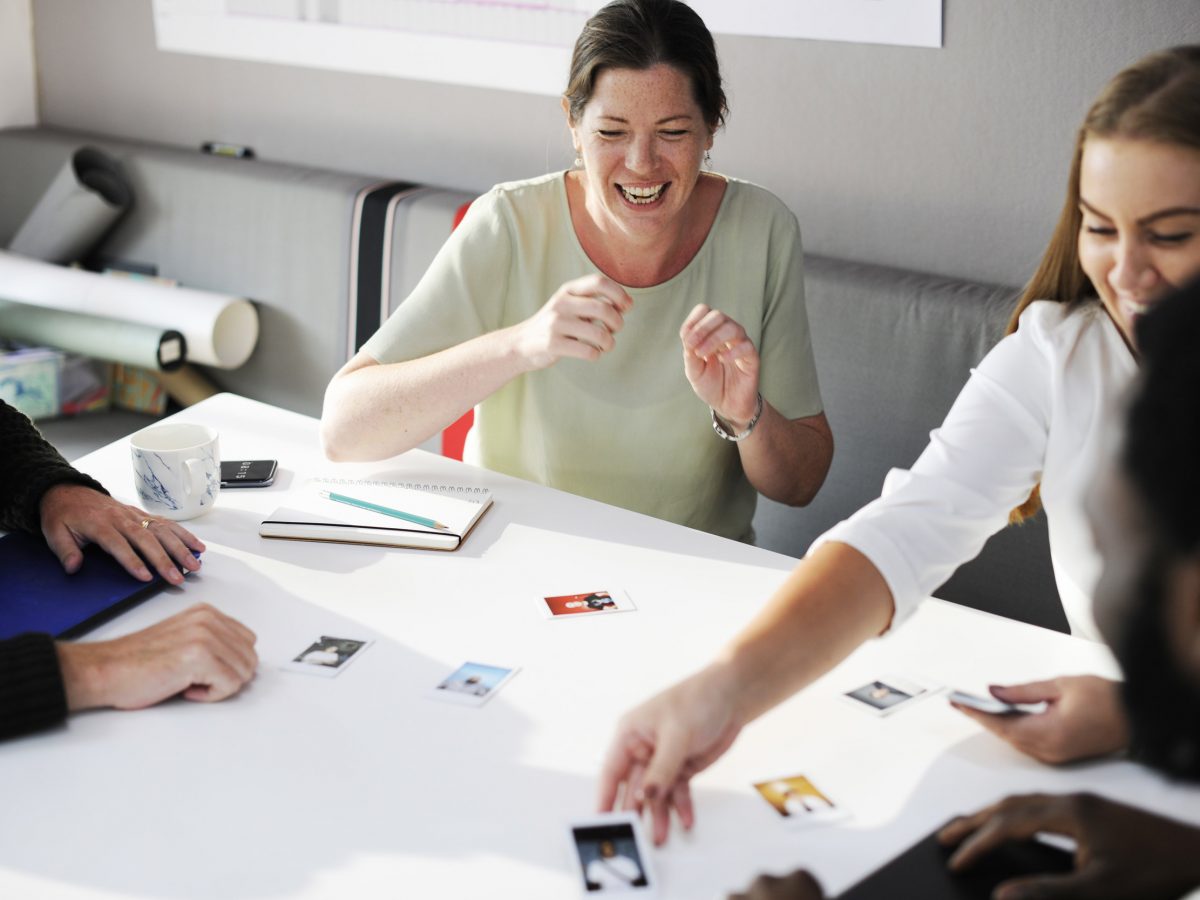 People Looking Choosing at Colleagues Photo